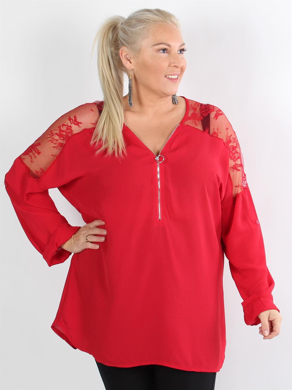 Kleo - Svart tunika med spetsar på axlarna och silverfärgad dragkedja